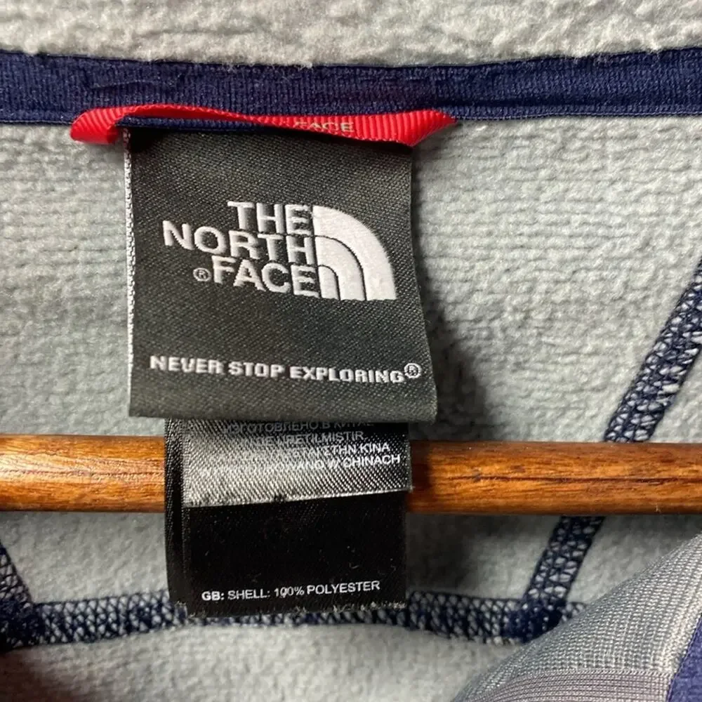The North Face blue and orange patterned 1/2 full zip pullover size small